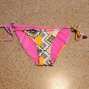 pink with geometric design ajustable sides with stones at ends of ties,S /8-10